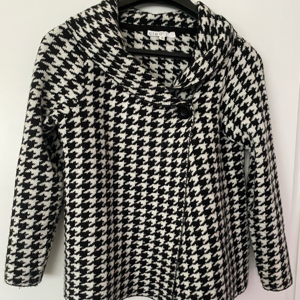 Cleo two button closure. New used condition.